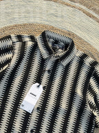 White textured half-sleeve shirt.